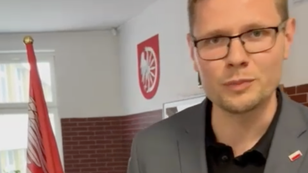 michał woś