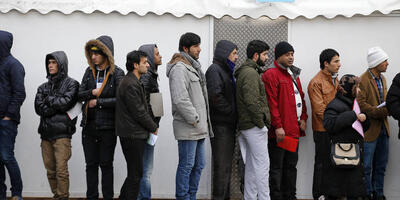 imigranci w Niemczech w kolejce po zasiłek